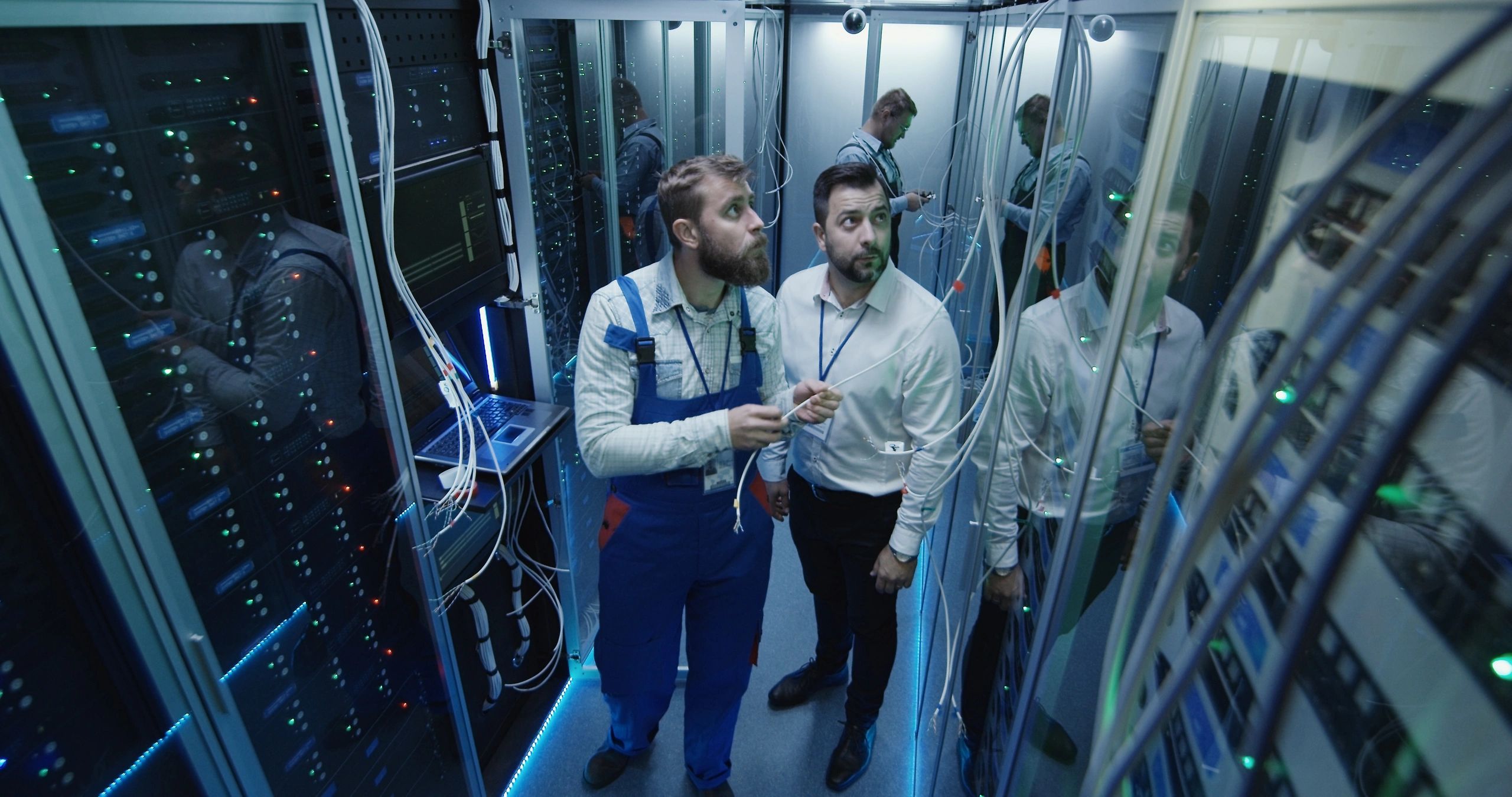 IT professionals working in a server room